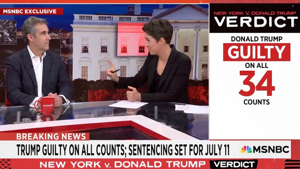 A man and a woman sit at a cable news desk. They are Michael Cohen and Rachel Maddow. Graphics on screen talk about Trump being found guilty on 34 counts.