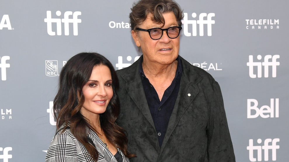 An older man with a middle-aged woman.