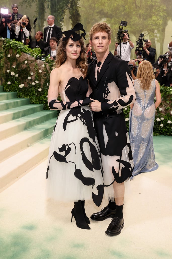 Hannah Bagshawe and Eddie Redmayne attend The 2024 Met Gala Celebrating "Sleeping Beauties: Reawakening Fashion" at The Metropolitan Museum of Art on May 06, 2024 in New York City.