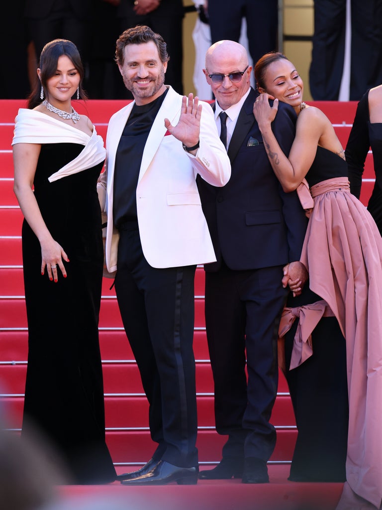 Selena Gomez, Édgar Ramírez, Jacques Audiard and Zoe Saldana attend the "Emilia Perez" red carpet during The 77th Annual Cannes Film Festival at Palais des Festivals on May 18, 2024 in Cannes, France.