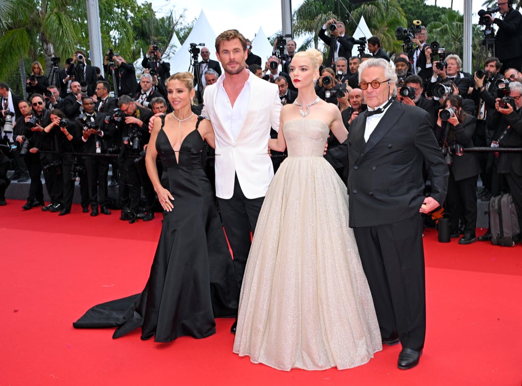 Elsa Pataky, Chris Hemsworth, Anya Taylor-Joy and George Miller attend the "Furiosa: A Mad Max Saga" (Furiosa: Une Saga Mad Max) Red Carpet at the 77th annual Cannes Film Festival at Palais des Festivals on May 15, 2024 in Cannes, France.