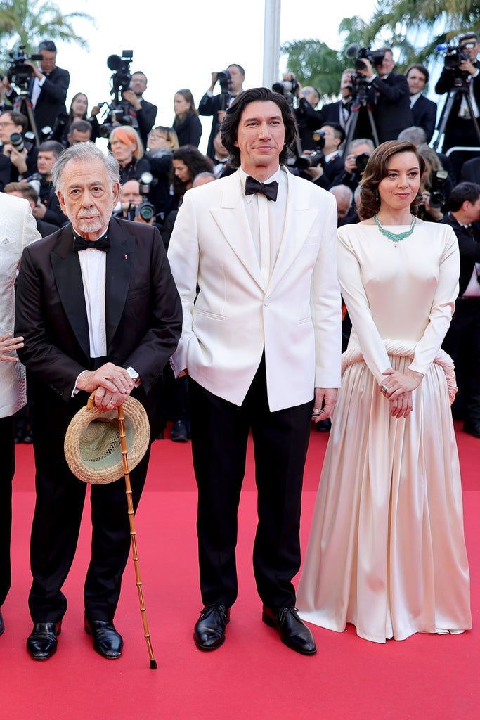 Francis Ford Coppola, Adam Driver and Aubrey Plaza attend the "Megalopolis" Red Carpet at the 77th annual Cannes Film Festival at Palais des Festivals on May 16, 2024 in Cannes, France.