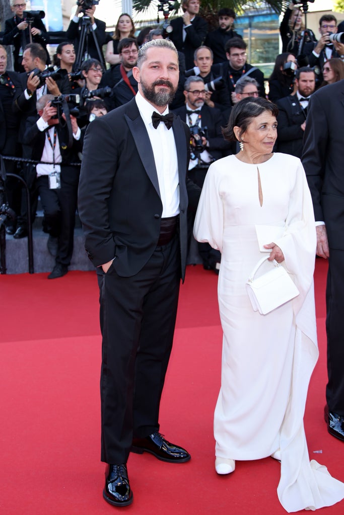 Shia LaBeouf and Kathryn Hunter attend the "Megalopolis" Red Carpet at the 77th annual Cannes Film Festival at Palais des Festivals on May 16, 2024 in Cannes, France.