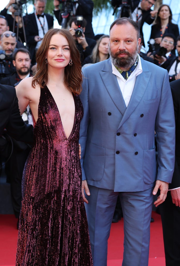 Emma Stone and Yorgos Lanthimos attend the "Kinds Of Kindness" Red Carpet at the 77th annual Cannes Film Festival at Palais des Festivals on May 17, 2024 in Cannes, France.