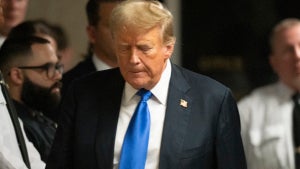 Former U.S. President Donald Trump walks to go speak to the media after being found guilty following his hush money trial at Manhattan Criminal Court