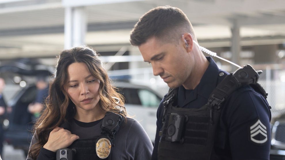 Melissa O'Neil and Eric Winter wear police uniforms in "The Rookie" Season 6