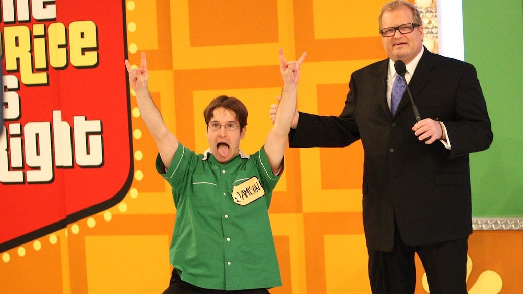 Host Drew Carey and a contestant on "The Price Is Right" in 2010