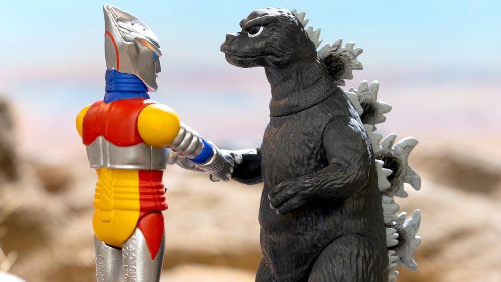 Godzilla and Jet shaking hands