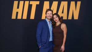 Glen Powell and Adria Arjona attend a photo call celebrating Netflix's new film "Hit Man" at Four Seasons Hotel