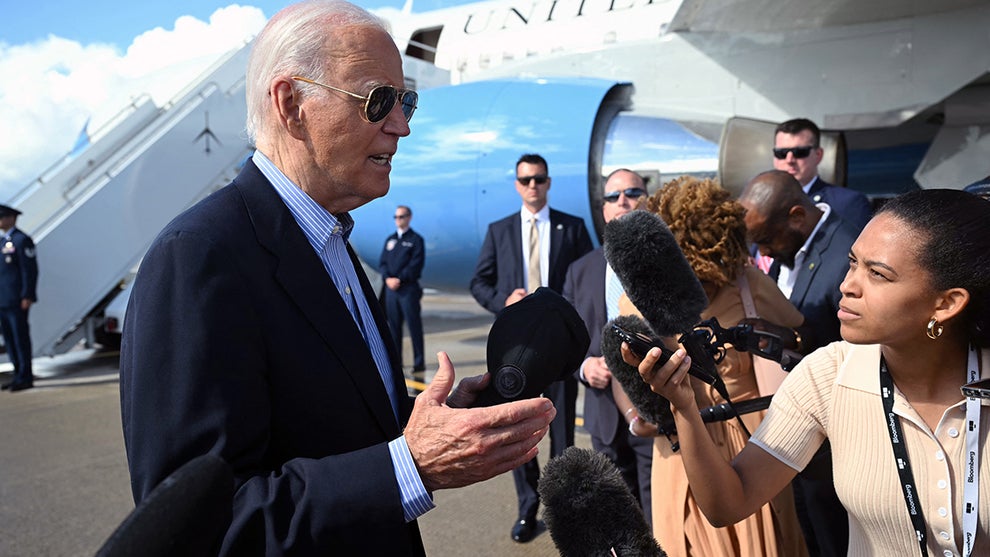 US President Joe Biden speaks with the press before boarding Air Force One prior to departure from Dane County Regional Airport in Madison, Wisconsin, July 5, 2024, as he travels to Wisconsin for campaign events.