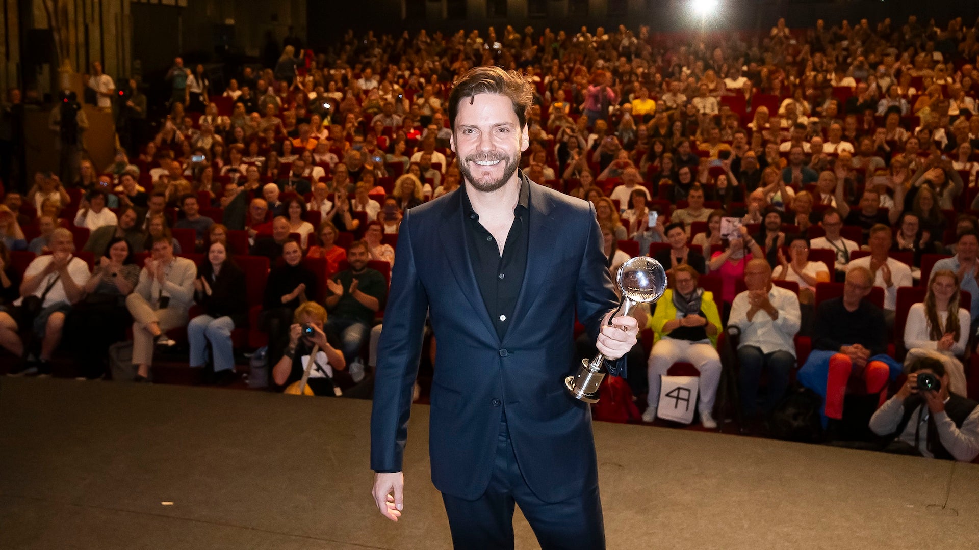Daniel Bruhl Evolves From Marvel to a Satire About Franchises