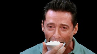 Hugh Jackman Gets Paranoid on ‘Hot Ones’ After Sean Evans Saves Him With Ice Cream, Says There’s ‘F–king Chili in It!’ | Video
