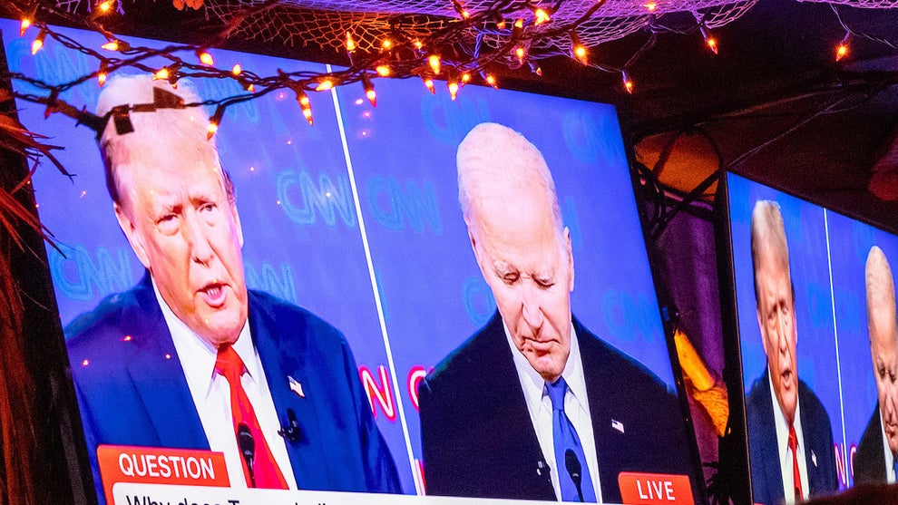 People watch the presidential debate between U.S. President Joe Biden and presumptive Republican nominee, former President Donald Trump at Wicked Willy's in New York City