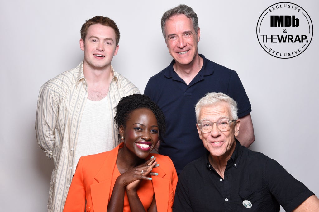 (L-R) Kit Connor, Lupita Nyong'o, guest and Chris Sanders pose in the IMDboat Exclusive Portrait Studio at San Diego Comic-Con 2024 at The IMDb Yacht on July 27, 2024 in San Diego, California.