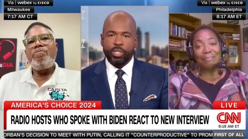 Victor Blackwell and two guests in a three-way split screen on CNN