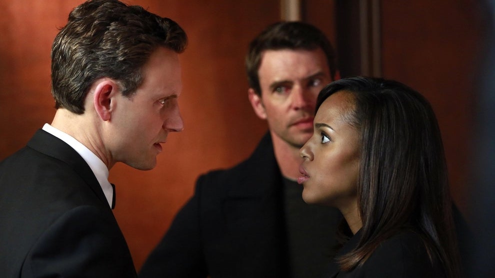 A man and a woman have a showdown with another man watching in the background. The men have light-toned skin while the woman is Black and has dark-toned skin.