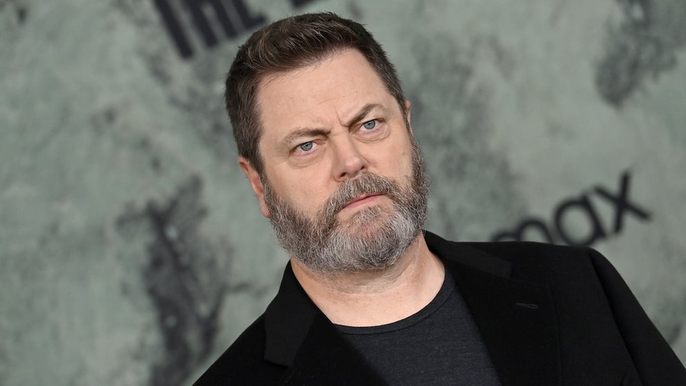 Actor Nick Offerman wearing a dark T-shirt and black sport coat.