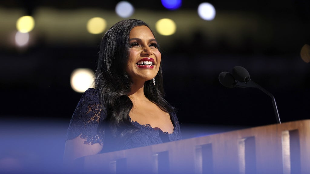 Actress Mindy Kaling speaks on stage during the third day of the Democratic National Convention at the United Center on night three (Credit: Justin Sullivan/Getty Images)