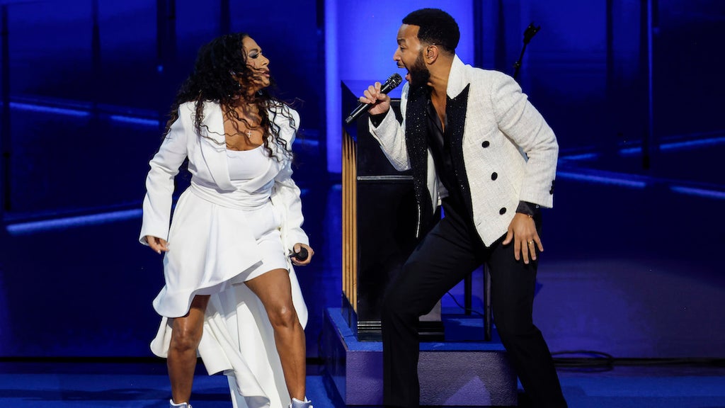Musicians John Legend and Sheila E. perform on stage during the third day of the Democratic National Convention at the United Center (Credit: Chip Somodevilla/Getty Images)