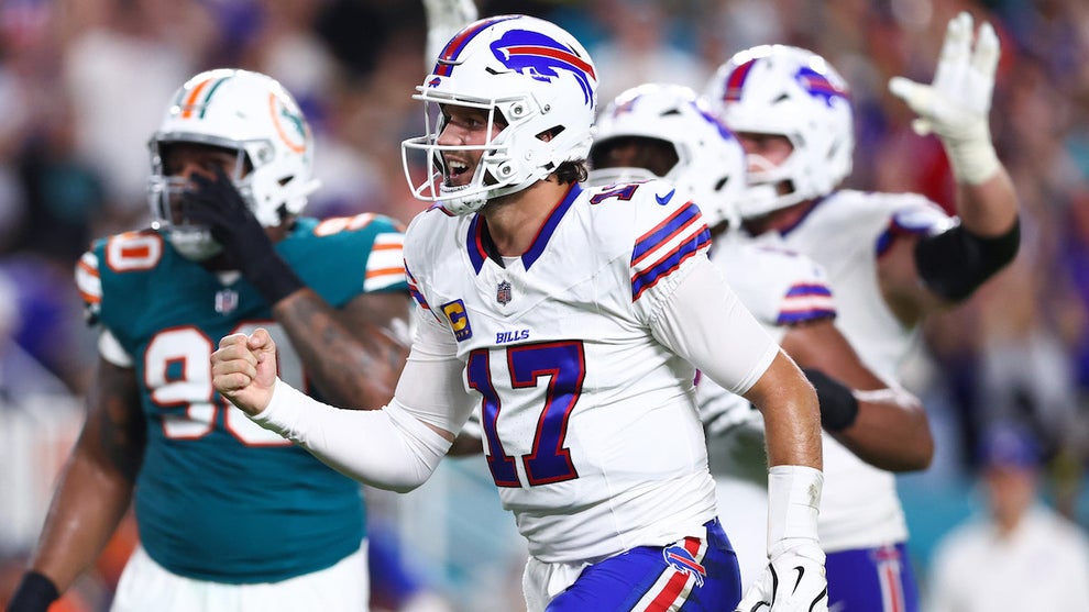Josh Allen of the Buffalo Bills celebrates a touchdown against the Miami Dolphins