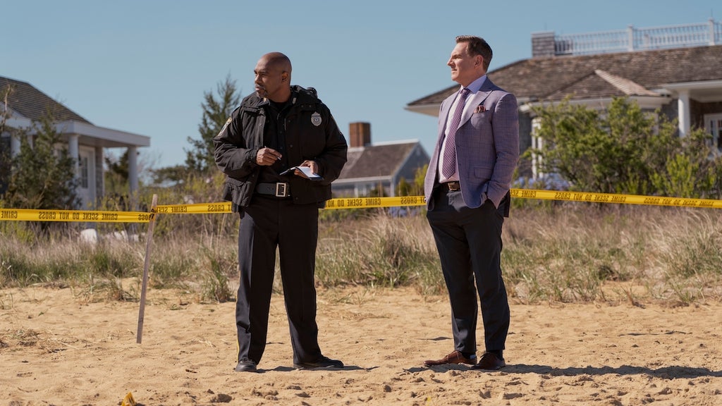 Michael Beach (L) as Dan Carter, Tim Bagley (R) as Roger Pelton in "The Perfect Couple." (Credit: Seacia Pavao/Netflix)