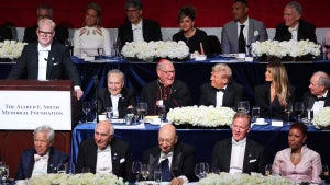 Comedian Jim Gaffigan speaks as U.S. Senate Majority Leader Chuck Schumer (D-NY); Cardinal Timothy Dolan; Republican presidential nominee, former U.S. President Donald Trump; and former first lady Melania Trump react during the annual Alfred E. Smith Foundation Dinner (Credit: Michael M. Santiago/Getty Images)