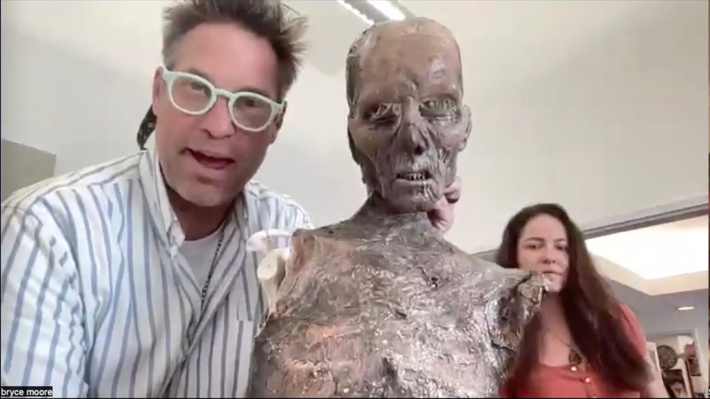 "9-1-1" prop master Bryce Moore and assistant prop master Megan Casey with the skeleton prop used in the "Masks" episode