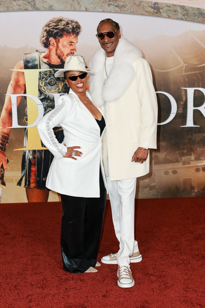 HOLLYWOOD, CALIFORNIA - NOVEMBER 18: (L-R) Shante Broadus and Snoop Dogg attend the Los Angeles premiere of Paramount Pictures' "Gladiator II" at TCL Chinese Theatre on November 18, 2024 in Hollywood, California. (Photo by Matt Winkelmeyer/Getty Images)