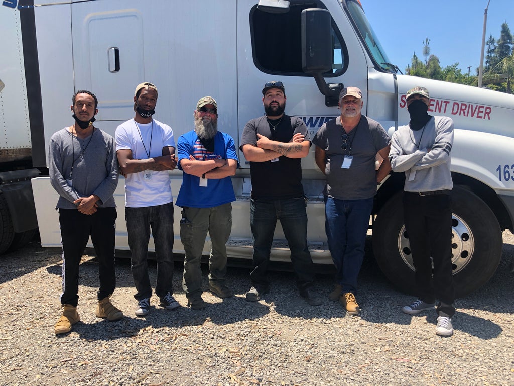 Zeke Richardson and five other students at Swift Trucking School
