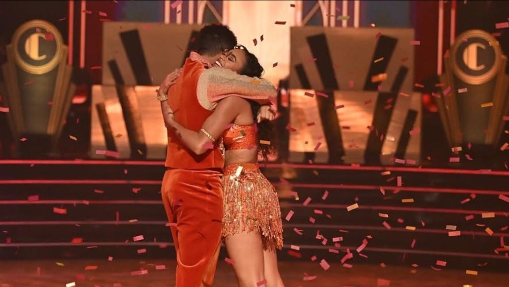 Brandon Armstrong and Chandler Kinney embrace after their historic freestyle during the Season 33 finale.