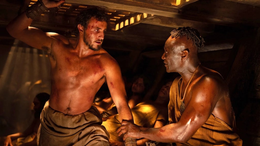 Peter Mensah (right) as Jubartha in Gladiator II"