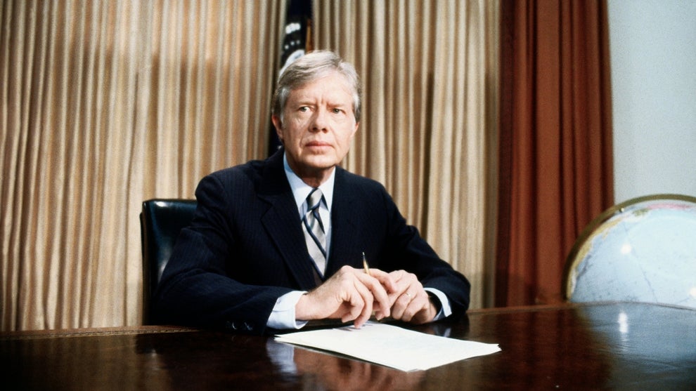 DC: A grim-faced President Jimmy Carter, seated at desk in Oval Office of White House tells of the aborted rescue effort intended to get the 53 American hostages out of Iran