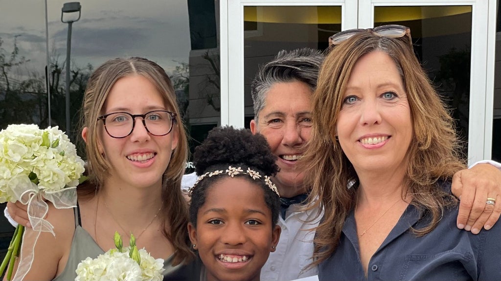 Kirsten Schaffer with her wife Linda Kennedy and daughters Olive and Masi