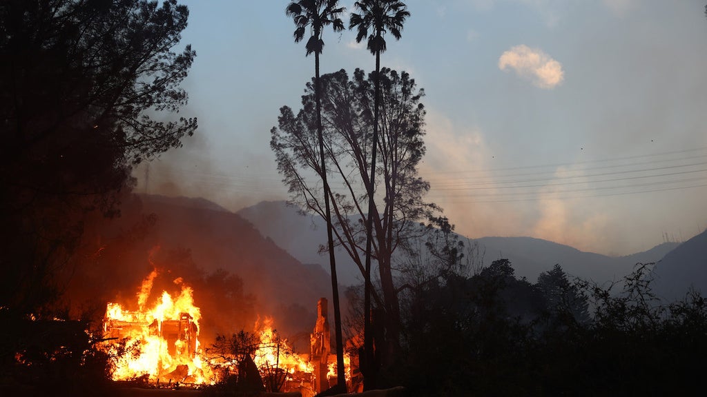A home burns during the Eaton fire. (Credit: Mario Tama/Getty Images)