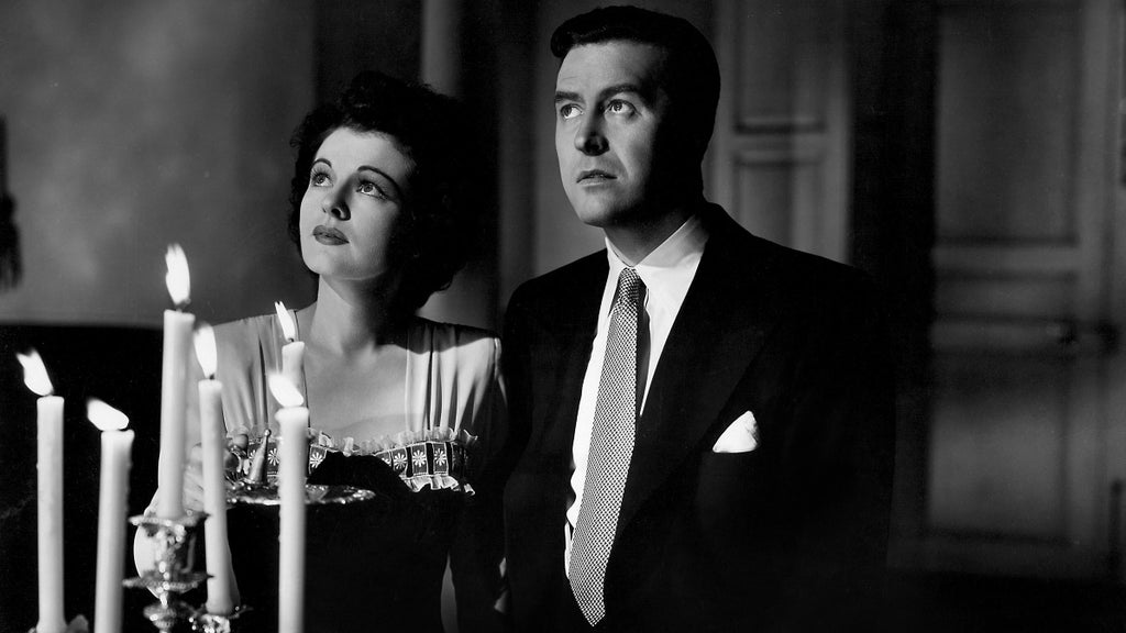 Ruth Hussey and Ray Milland in "The Uninvited."