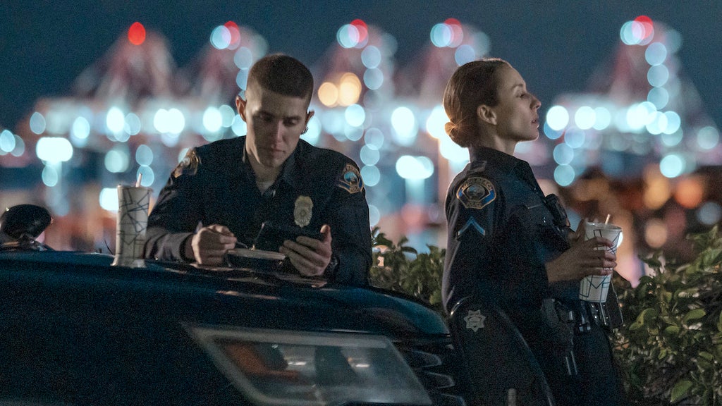 Brandon Larracuente and Troian Bellisario in "On Call"