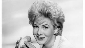 Actress Jan Shepard (while holding a duckling) is behind a nest with mother duck, her ducklings and eggshells in a publicity shot from 1963, United States. (Photo by De Carvalho Collection/Getty Images)