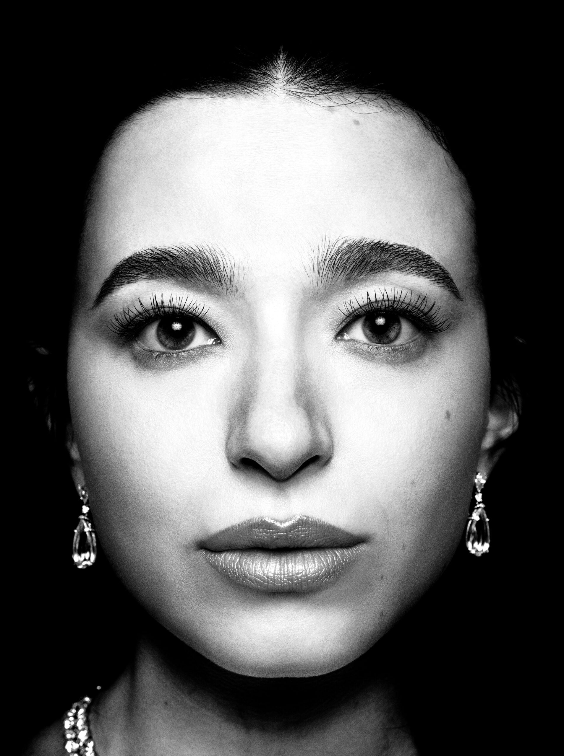 MIKEY MADISON, Anora. Mikey wears earrings and necklace, both by Tiffany & Co