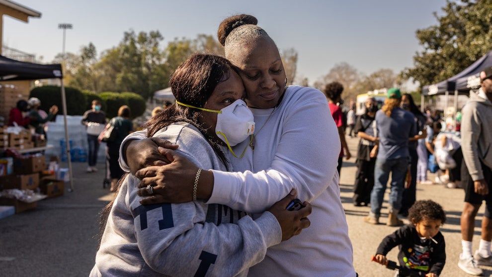 Altadena evacuees gather at a donation center on Jan. 11 (Credit: Jason Armond / Los Angeles Times via Getty Images)