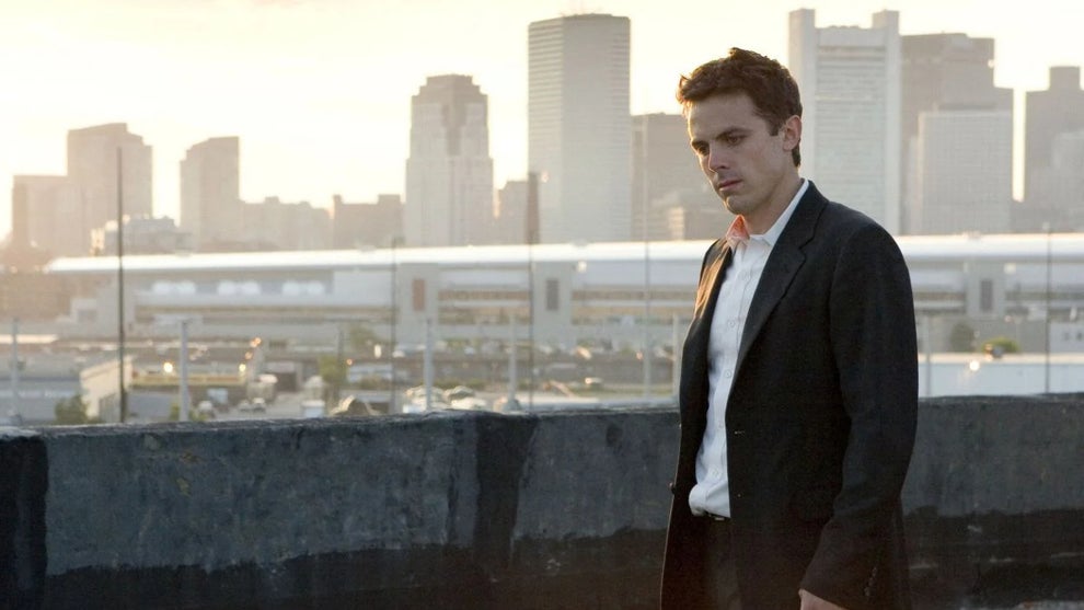 Casey Affleck stands on a rooftop in "Gone Baby Gone."