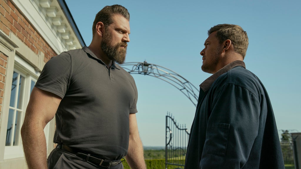 Olivier Richters as Paulie and Alan Ritchson as Jack Reacher in "Reacher" (Credit: Amazon Studios)