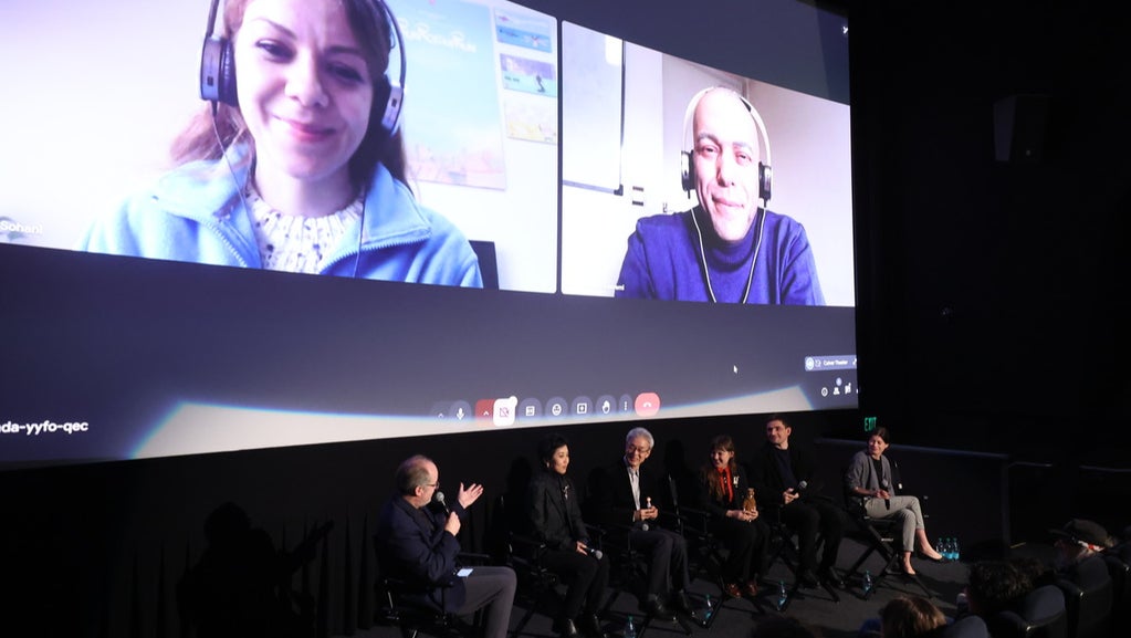 Front row (left to right): TheWrap’s Executive Editor of Awards Steve Pond with translator, "Magic Candies" producer Takashi Washio, "Yuck!" producer Juliette Marquet and director Loïc Espuche, and "Wander to Wonder" director/producer Nina Gantz at the shorts showcase on Feb. 11. On the screen is "In The Shadow of The Cypress" directors/producers Shirin Sohani (left) and Hossein Molayemi. (Randy Shropshire for TheWrap)