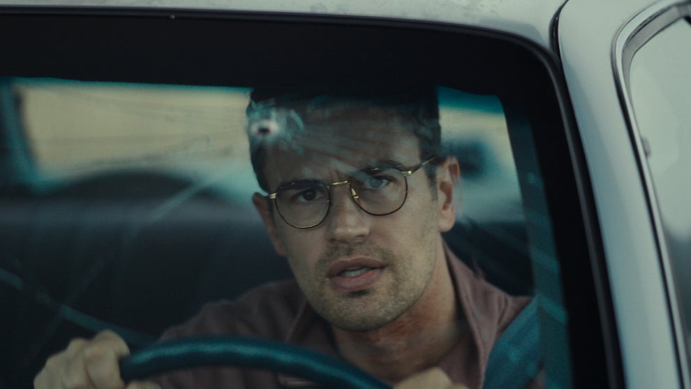 Theo James looks through a broken windshield in "The Monkey" (Credit: Neon)