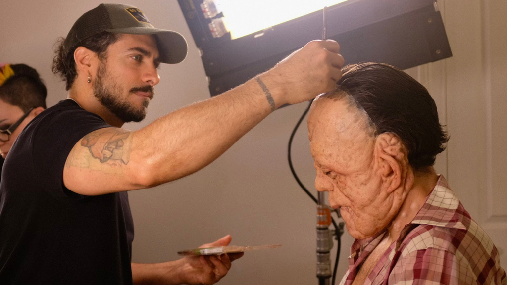 Makeup artist Mike Marino and actor Sebastian Stan on the set of "A Different Man" (A24)