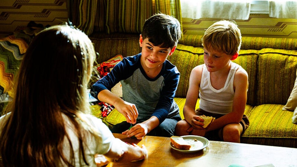Xander Mateo as Young Brian and Eli Sherman as Little Dexter in Dexter: Original Sin episode 8, season 1, streaming on Paramount+ with SHOWTIME, 2024. Photo Credit: Patrick Wymore/Paramount+ with SHOWTIME.
