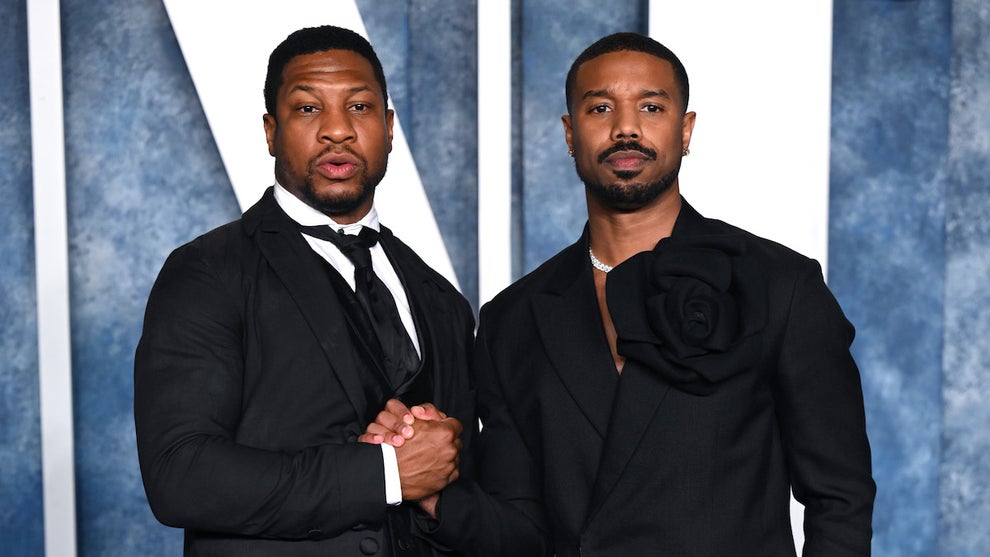 Jonathan Majors (L) and Michael B. Jordan attend the 2023 Vanity Fair Oscar Party