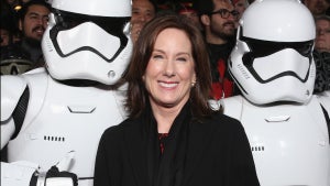 Lucasfilm President Kathleen Kennedy poses with Stormtroopers at the Premiere of Walt Disney Pictures and Lucasfilm's "Star Wars: The Force Awakens" at on December 14, 2015 in Hollywood, California. (Credit: Todd Williamson/Getty Images)