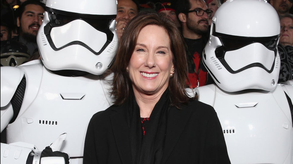 Lucasfilm President Kathleen Kennedy poses with Stormtroopers at the Premiere of Walt Disney Pictures and Lucasfilm's "Star Wars: The Force Awakens" at on December 14, 2015 in Hollywood, California. (Credit: Todd Williamson/Getty Images)