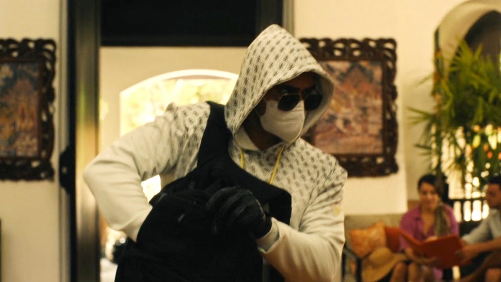 A masked robber in "The White Lotus" Season 3, Episode 2.