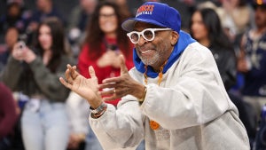 Spike Lee cheers from the sideline ahead of the game between the LA Clippers and the New York Knicks at Intuit Dome on March 07, 2025 in Inglewood, California